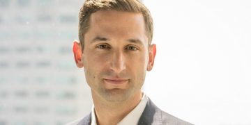 Early Coinbase Executive Adam White Is Leaving the Firm