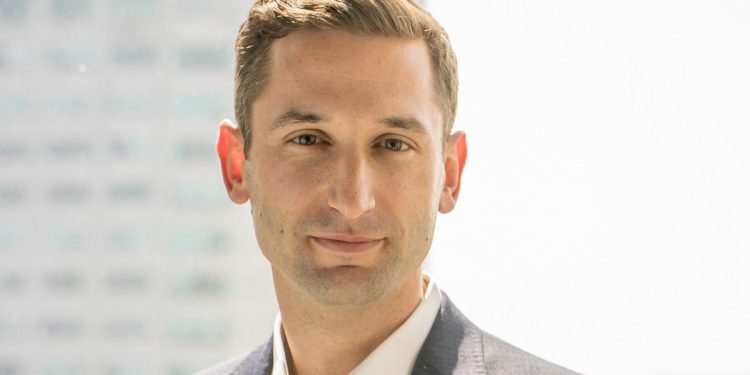 Early Coinbase Executive Adam White Is Leaving the Firm