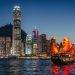cityscape hong kong and junkboat at twilight